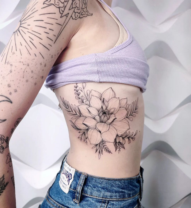 Women side flower, photo - Tattoo Master Liliana