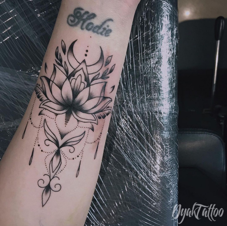 Women arm lotus flower, photo - Tattoo Master Anastasiya