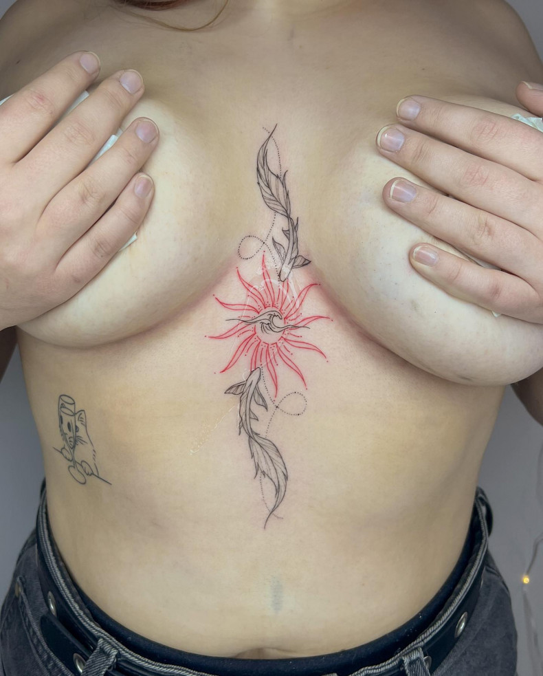 Women chest fish, photo - Tattoo Master Ruda Tattoo artist