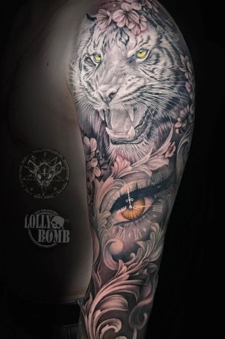 Auge Arm Tiger, photo - Tattoo-Meister Egor Sydorenko