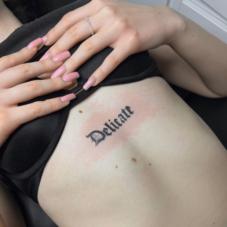 Women lettering stomach, photo - Tattoo Master Kate Boliukh