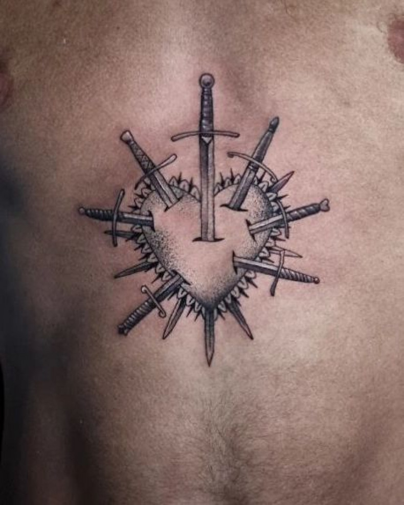 Men sword chest, photo - Tattoo Studio Rebel Ink