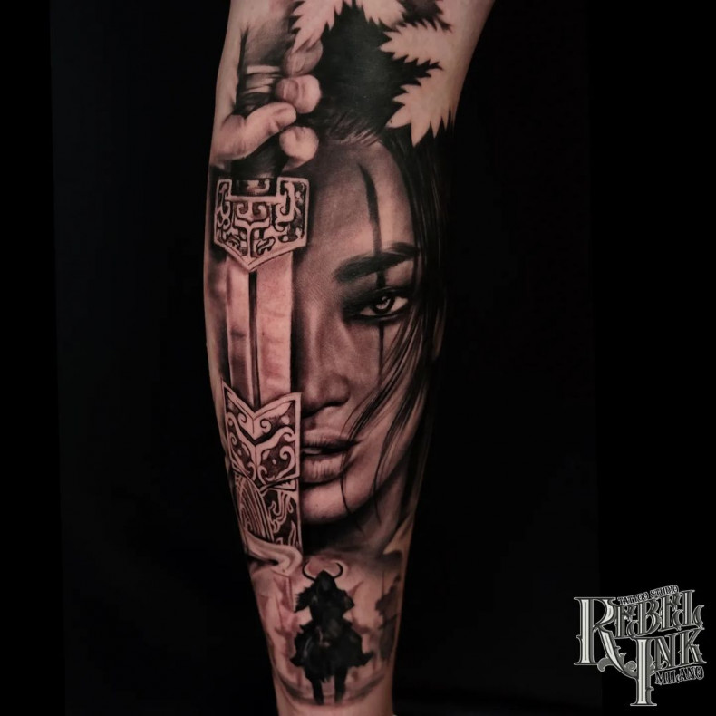 Men woman face sword, photo - Tattoo Studio Rebel Ink