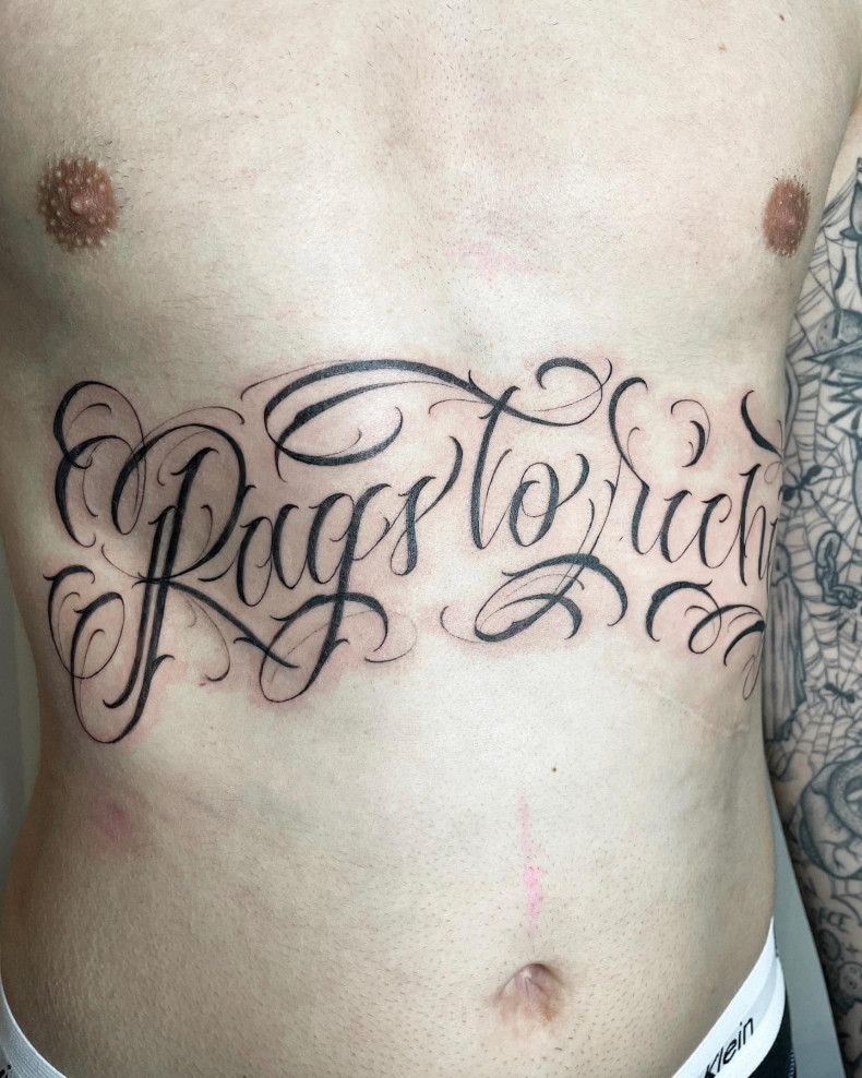 Men lettering stomach, photo - Tattoo Studio Neropaco