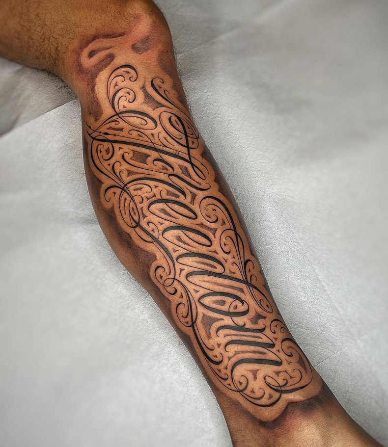 Men lettering leg, photo - Tattoo Studio Ambition Ink