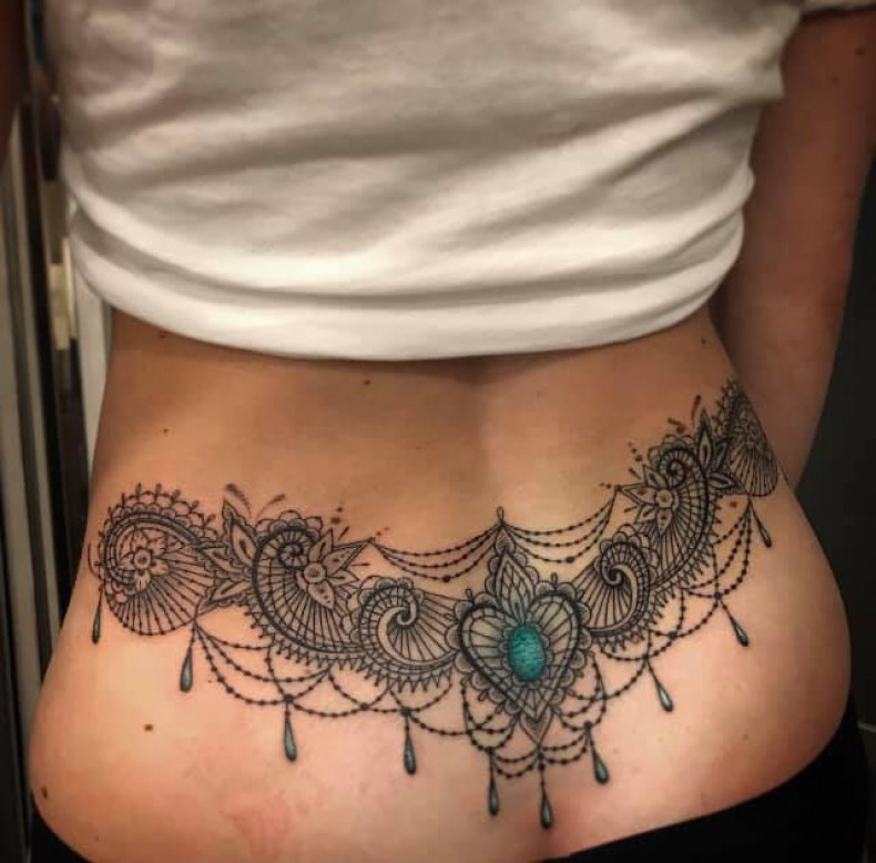 Women lace lower back, photo - Tattoo Studio Tribal Tattoo