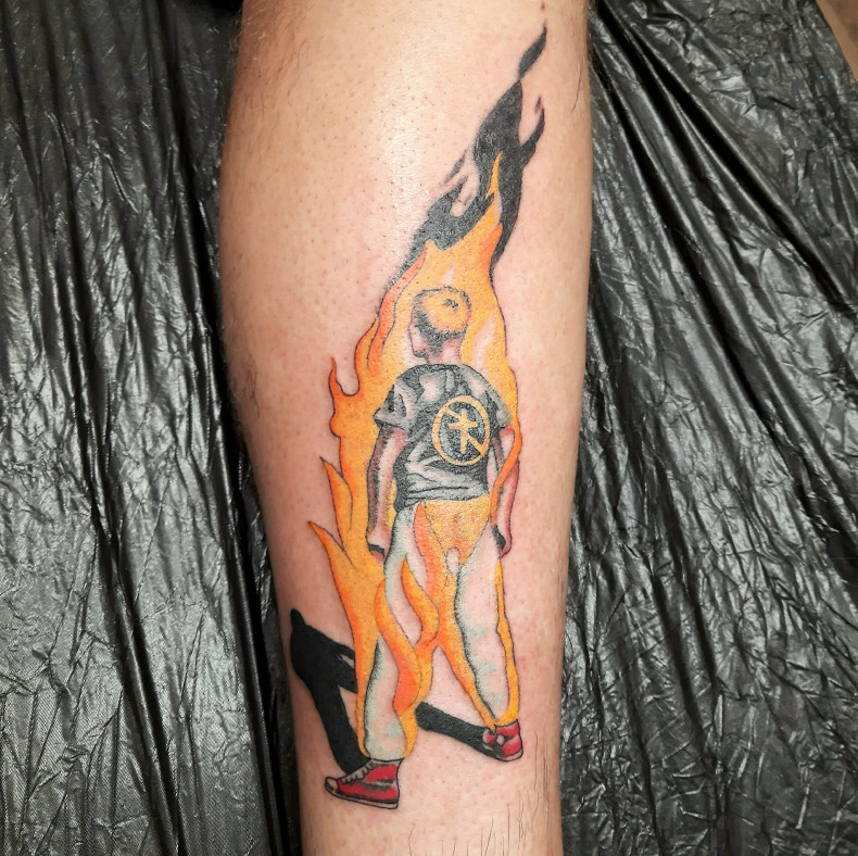 Men leg fire (flame), photo - Tattoo Studio Caligula