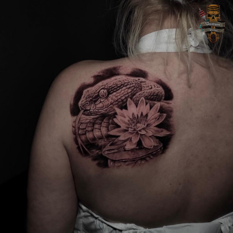 Women snake lotus flower, photo - Tattoo Studio Custom Tattoo