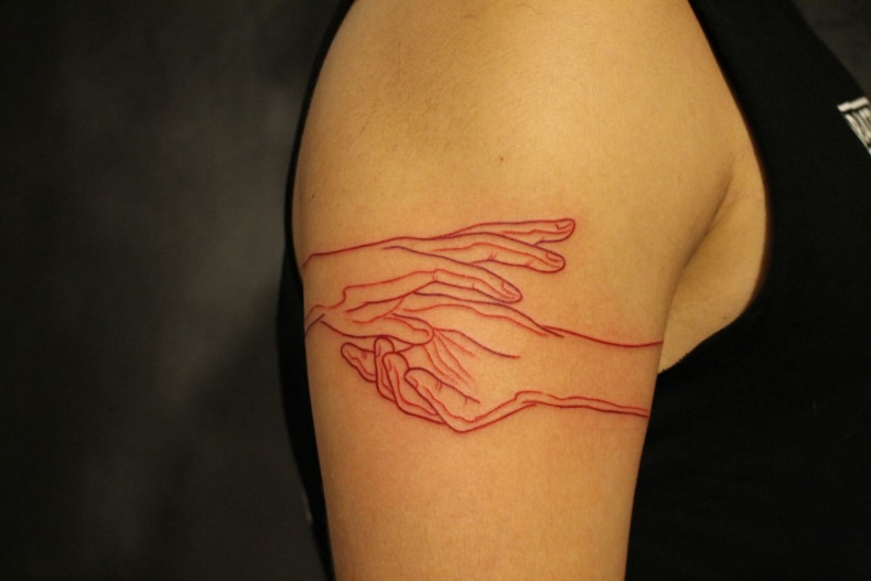 Shoulder hands, photo - Tattoo Studio East Side Ink