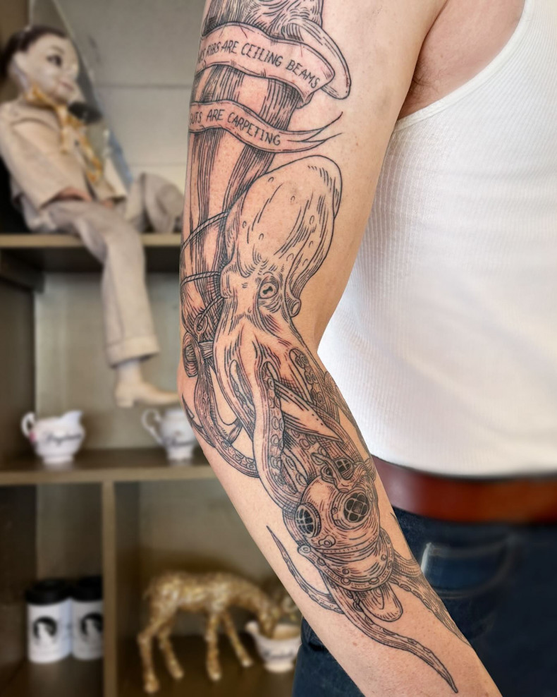 Men arm engraving, photo - Tattoo Studio White Rabbit