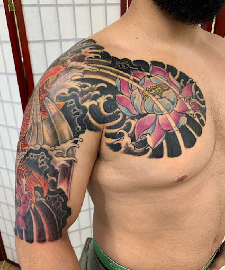 Men lily chest, photo - Tattoo Studio Rising Dragon