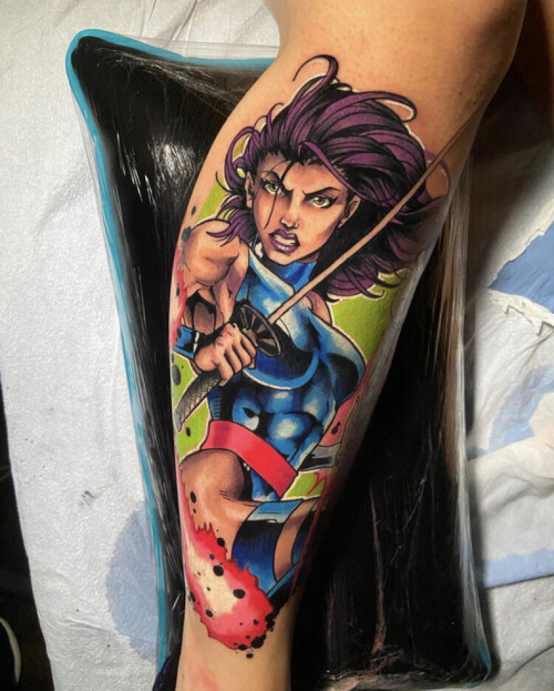 Woman face cartoons leg, photo - Tattoo Studio Sacred Tattoo