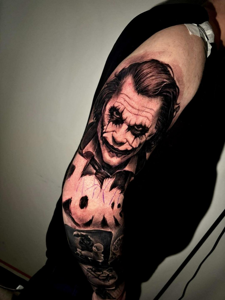 Men arm joker, photo - Tattoo Master Pawel Ochmanski