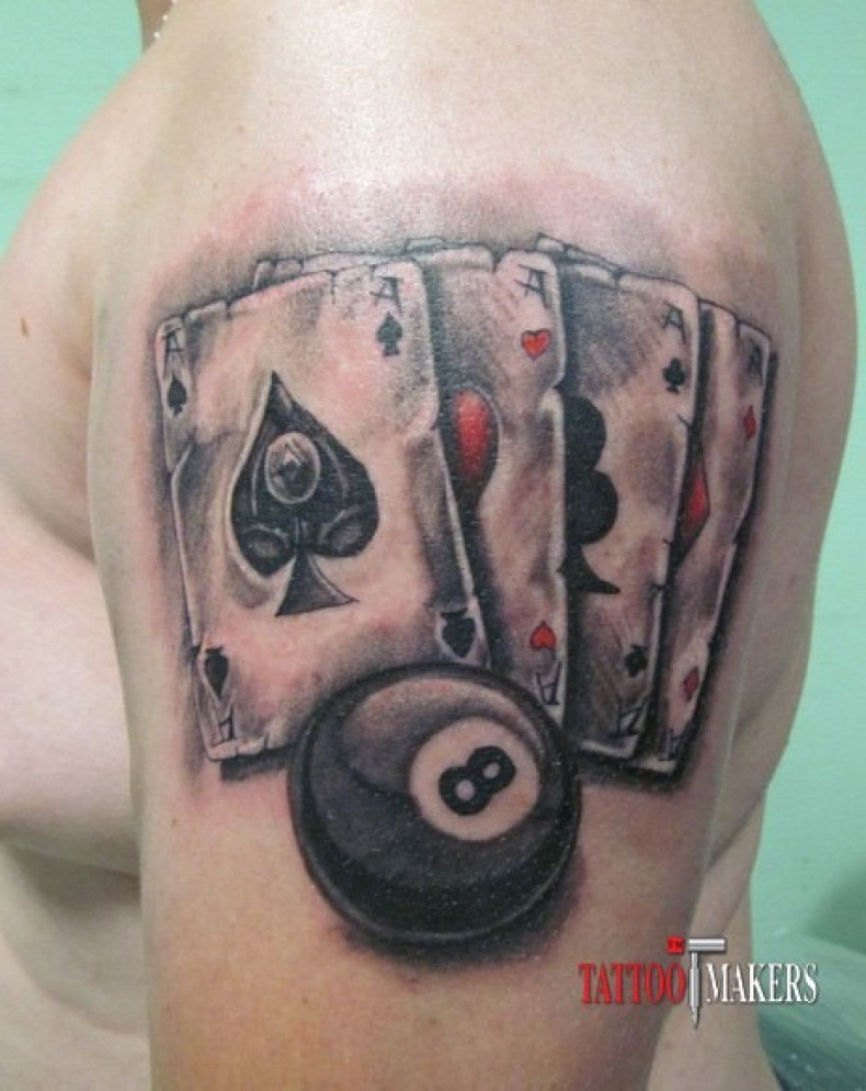 Men cards shoulder, photo - Tattoo Master Barb Tattoo