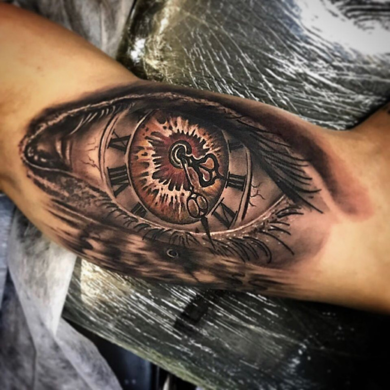 Men eye arm, photo - Tattoo Master Barb Tattoo