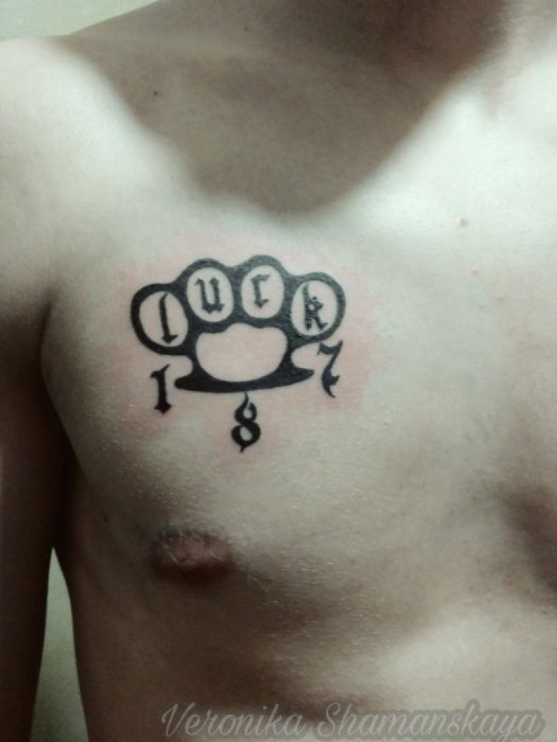 Men knuckle chest, photo - Tattoo Master Barb Tattoo