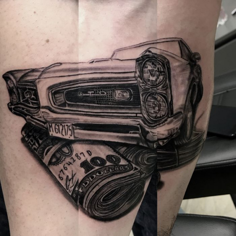 Men black and grey car, photo - Tattoo Master Barb Tattoo