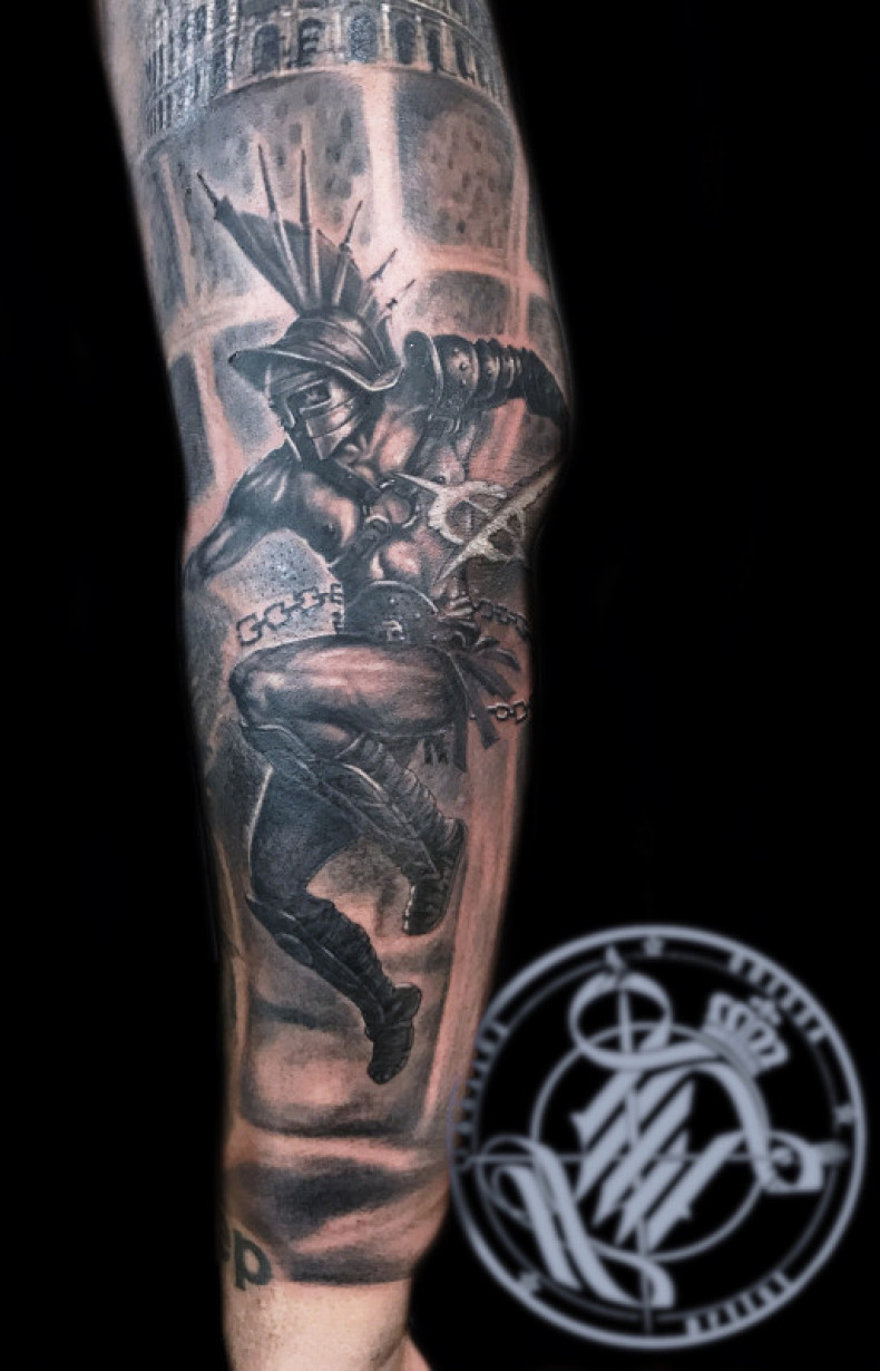 Men arm black and grey, photo - Tattoo Master Barb Tattoo