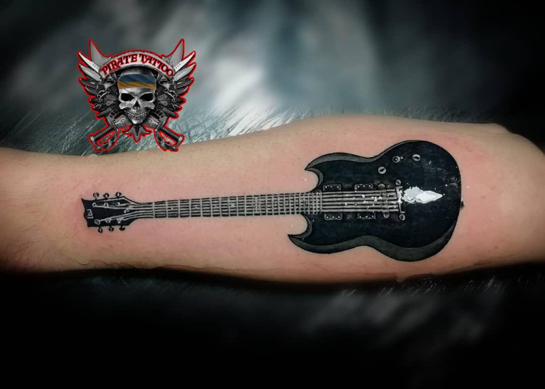 Men guitar forearm, photo - Tattoo Master Barb Tattoo