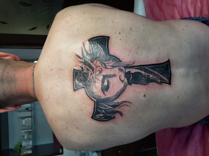 Men blackwork Jesus, photo - Tattoo Master Barb Tattoo