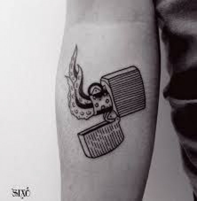 Men arm lighter, photo - Tattoo Master Barb Tattoo