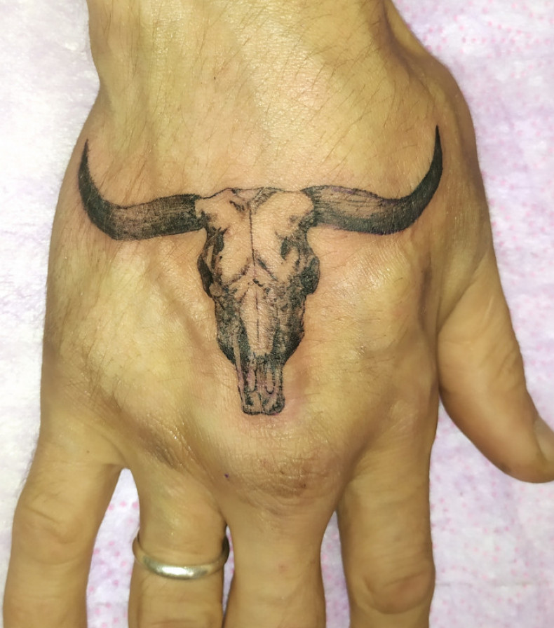 Men buffalo bull, photo - Tattoo Master Barb Tattoo