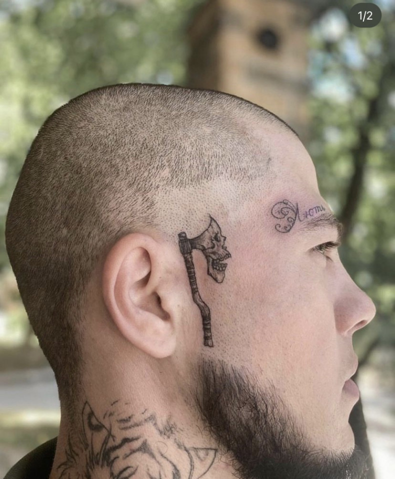 Men face axe, photo - Tattoo Master Barb Tattoo