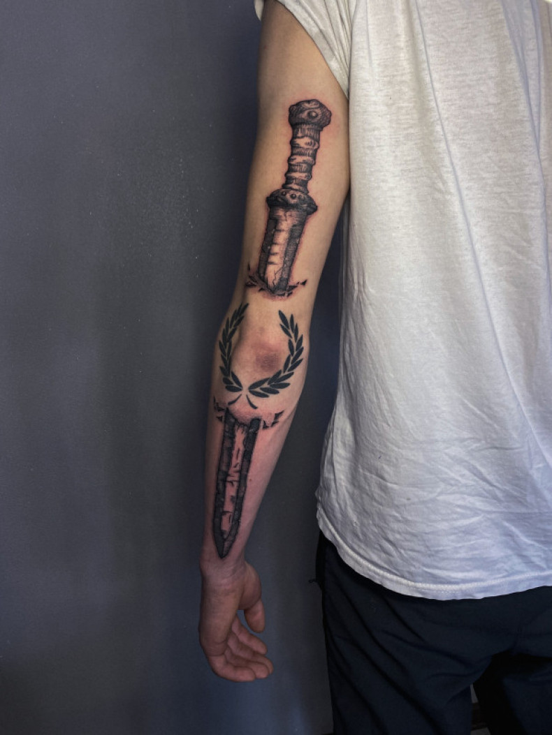 Men arm sword, photo - Tattoo Master Barb Tattoo