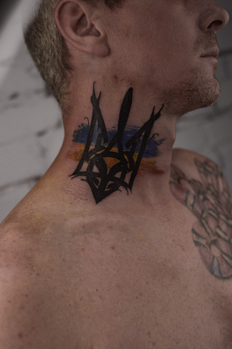 Men emblem of Ukraine neck, photo - Tattoo Master Barb Tattoo