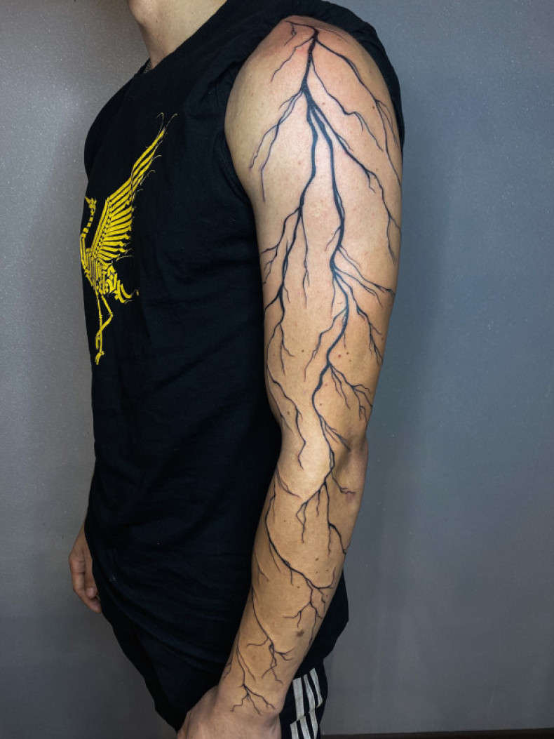 Men lightning sleeve, photo - Tattoo Master Barb Tattoo