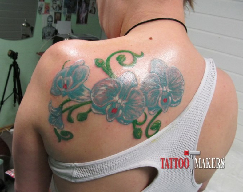 Women back orchid, photo - Tattoo Master Barb Tattoo