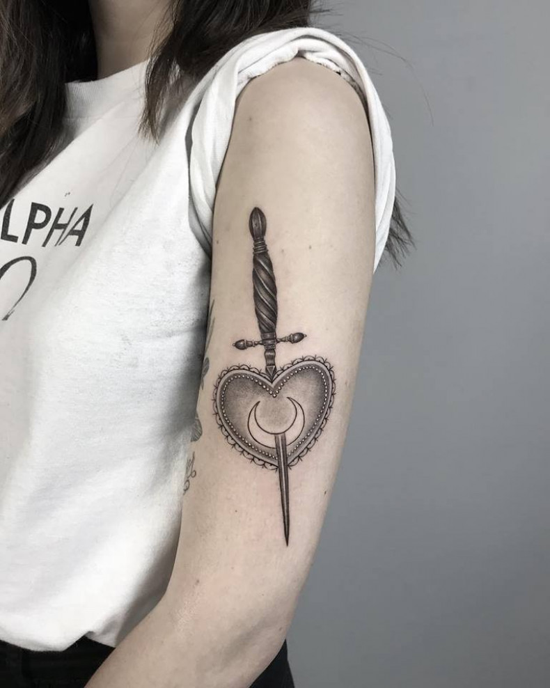 Women arm dagger, photo - Tattoo Master Barb Tattoo