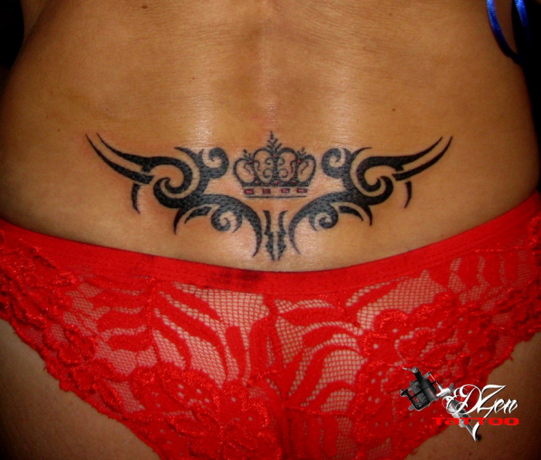 Women crown lower back, photo - Tattoo Master Barb Tattoo