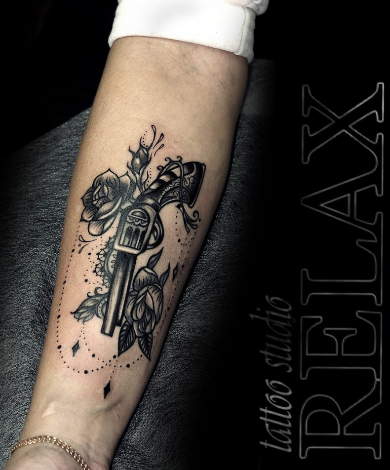 Women forearm gun, photo - Tattoo Master Barb Tattoo