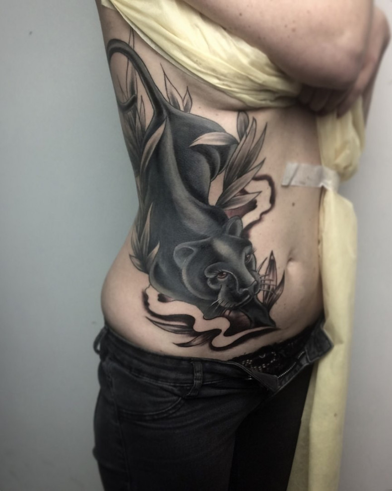 Women rib panther, photo - Tattoo Master Barb Tattoo