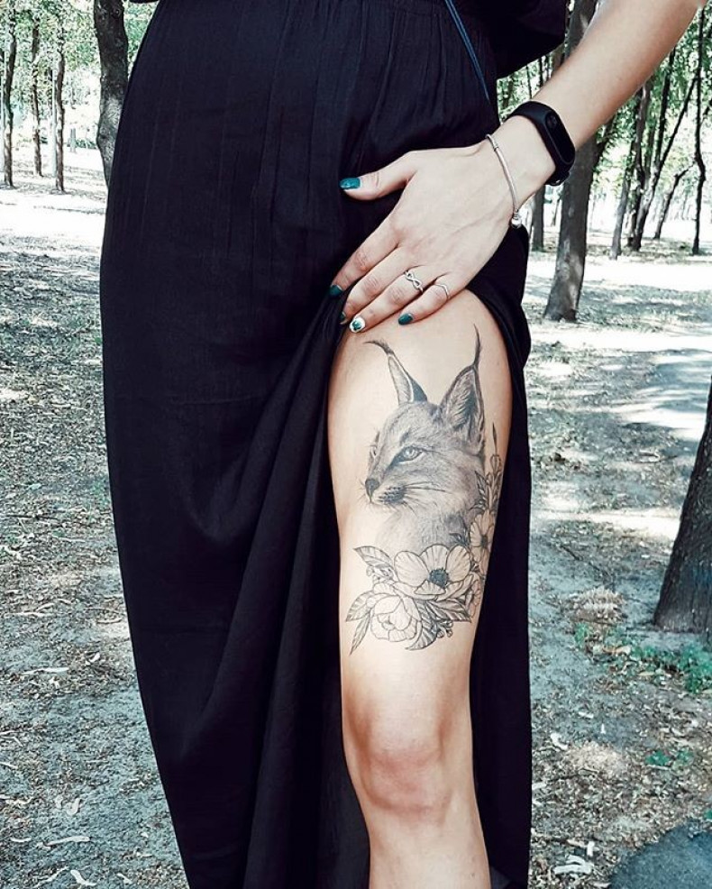 Women thigh lynx, photo - Tattoo Master Barb Tattoo