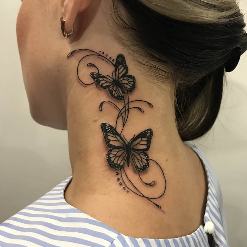 Women butterfly behind the ear, photo - Tattoo Master Barb Tattoo