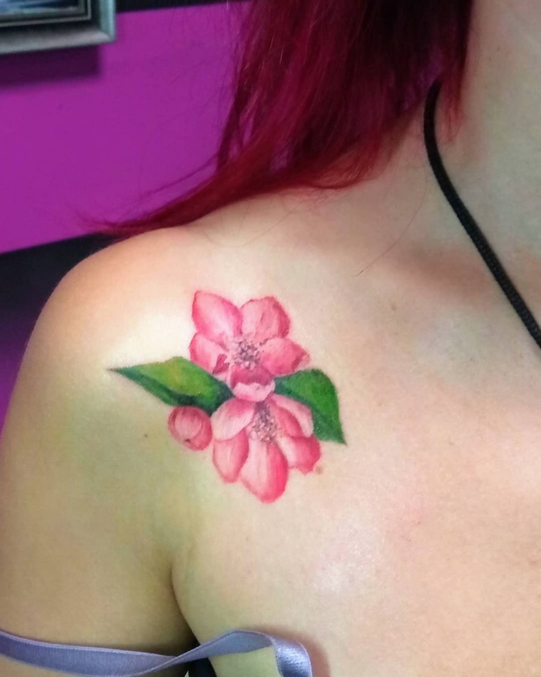 Women watercolor camellia, photo - Tattoo Master Barb Tattoo