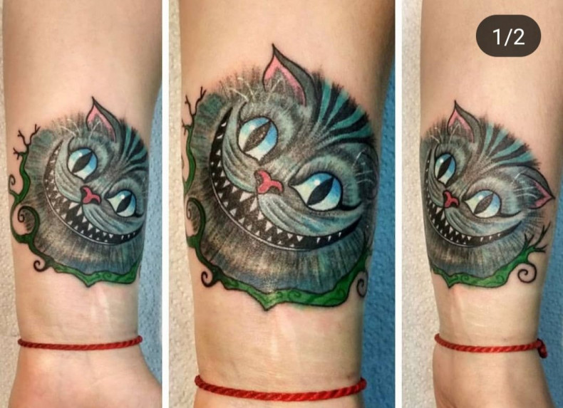 Women wrist Cheshire Cat, photo - Tattoo Master Barb Tattoo