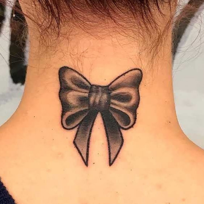 Women bow neck, photo - Tattoo Master Barb Tattoo