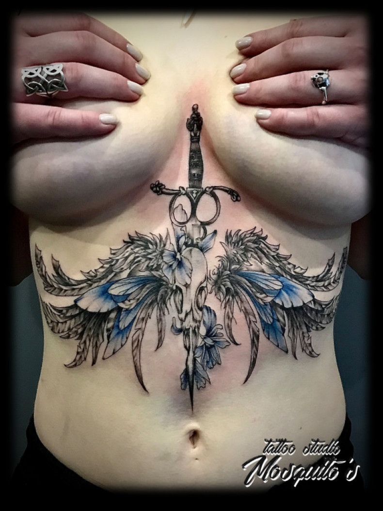 Women dagger under breast, photo - Tattoo Master Barb Tattoo