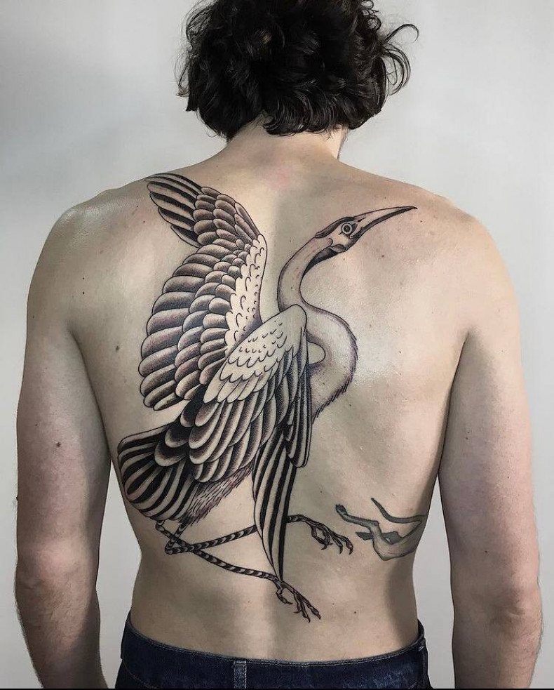 Women crane back, photo - Tattoo Master Barb Tattoo