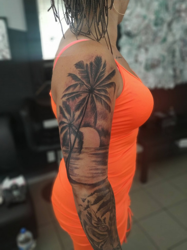 Women arm black and grey, photo - Tattoo Master Barb Tattoo