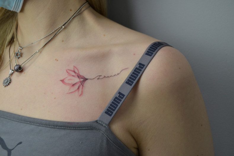 Women magnolia collarbone, photo - Tattoo Master Barb Tattoo