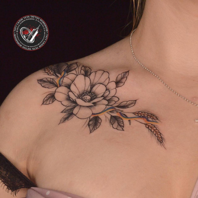 Women camellia ear, photo - Tattoo Master Barb Tattoo