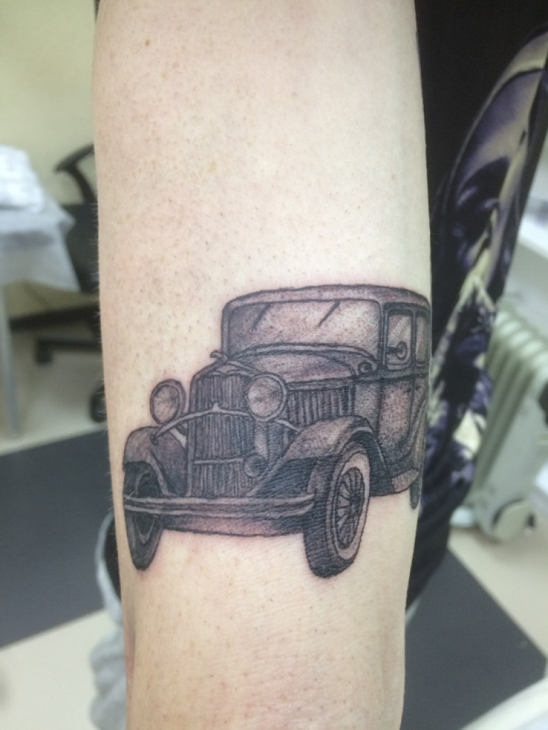 Arm black and grey car, photo - Tattoo Master Barb Tattoo