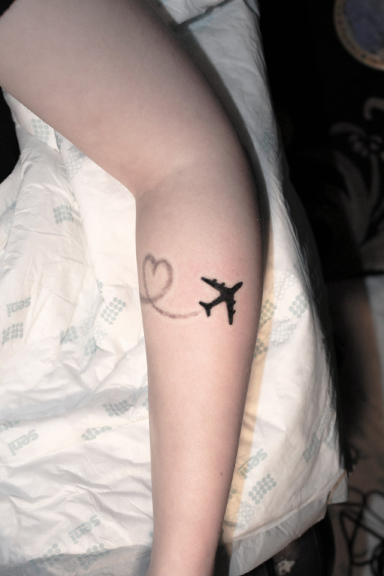 Arm airplane, photo - Tattoo Master Barb Tattoo