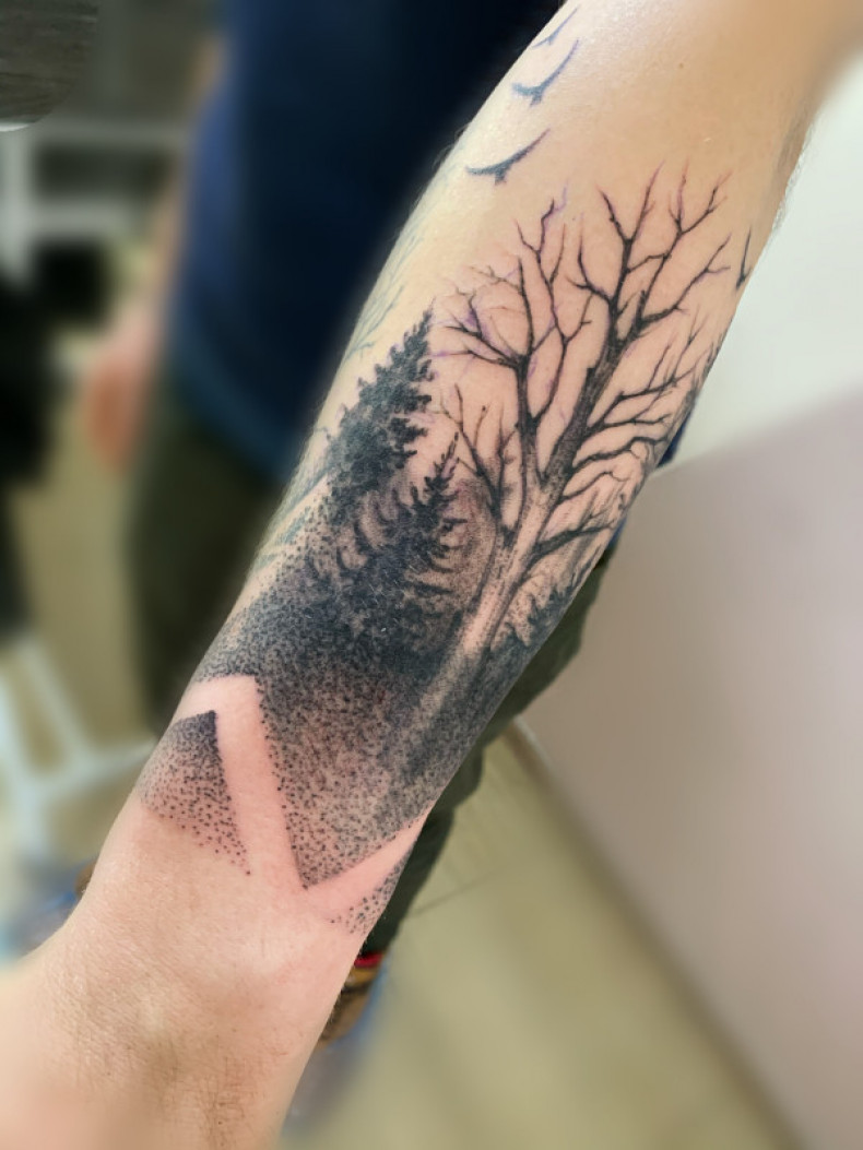 Arm christmas tree forest, photo - Tattoo Master Barb Tattoo