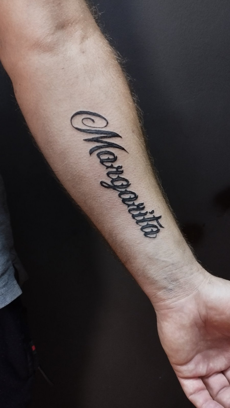 Arm name, photo - Tattoo Master Barb Tattoo