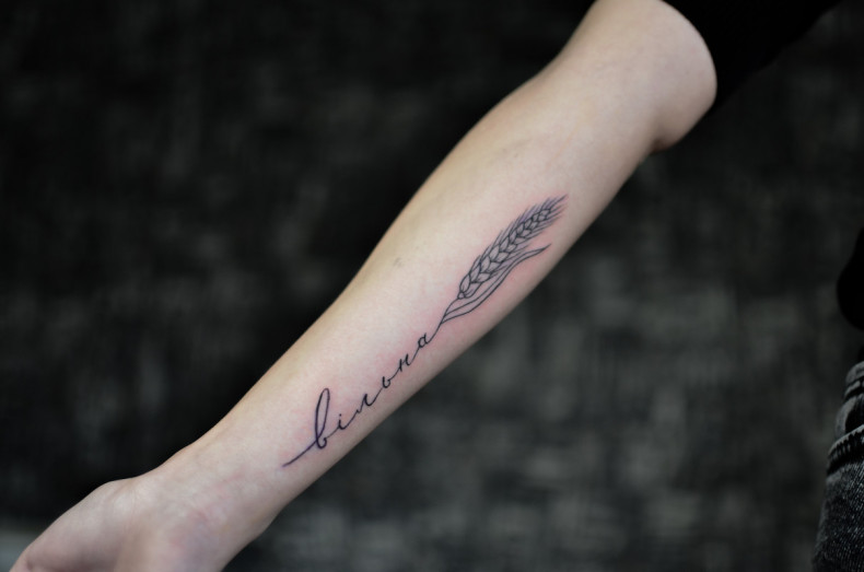 Arm name ear, photo - Tattoo Master Barb Tattoo